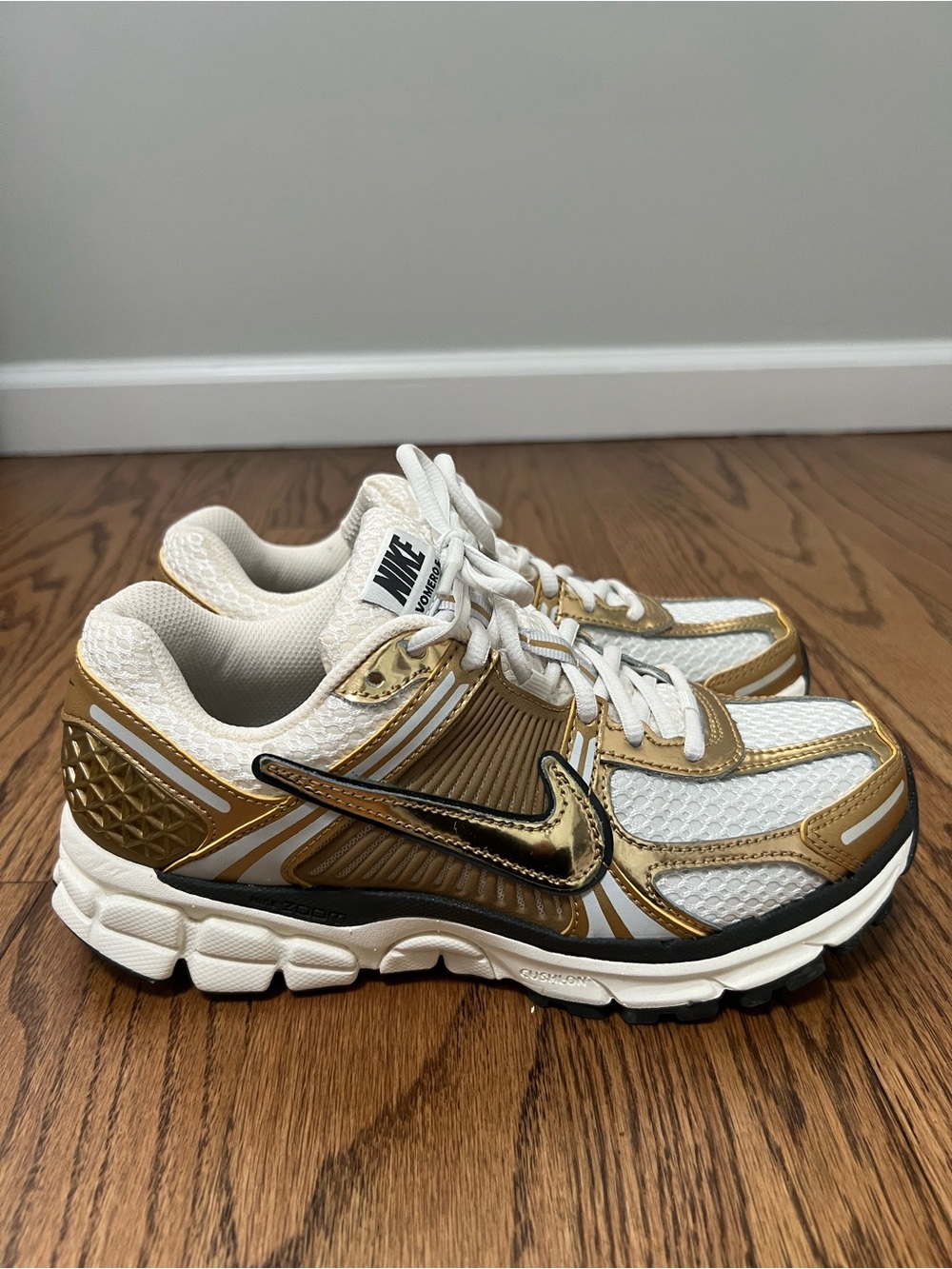 Nike Women’s White and Gold Athletic Sneakers